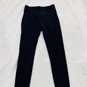 New black leggings with side pockets.